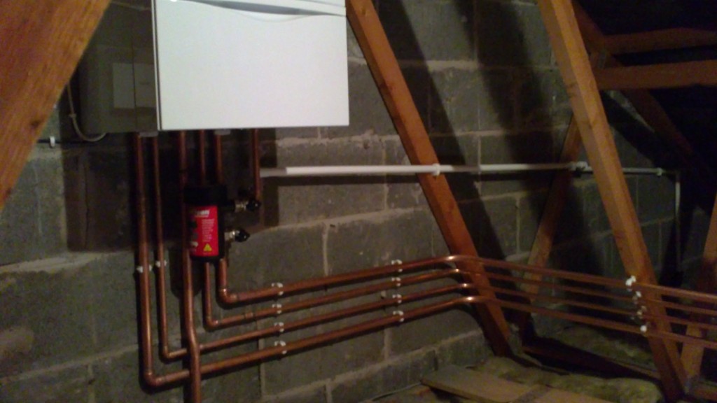 Example of pipework prior to insulating. It also shows a MagnaClean which helps keep your system clean and efficient