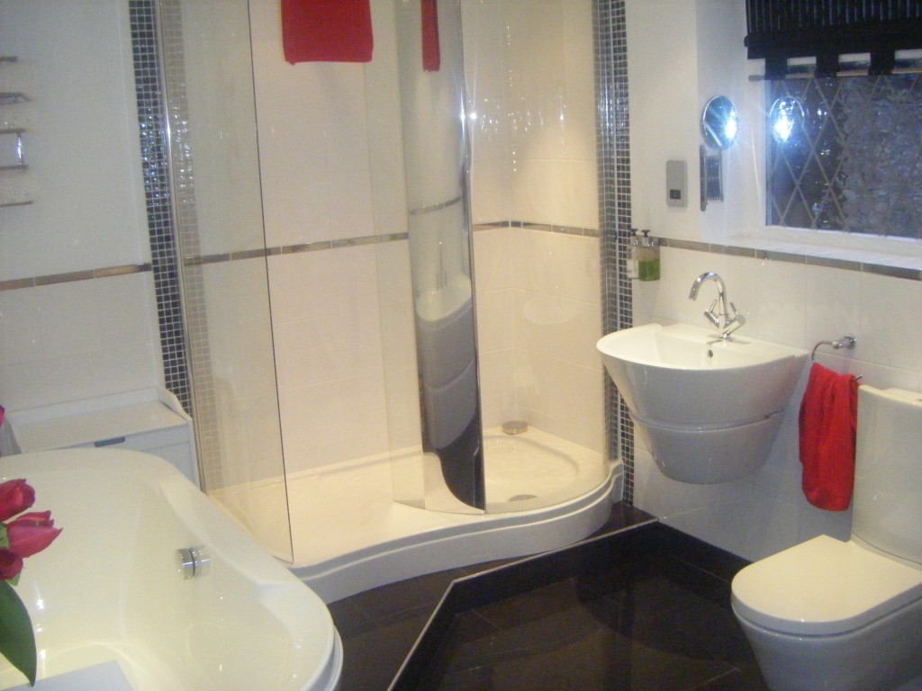 Walk- in shower cubicle and wall hung basin