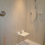 Completed shower panels, seat and shower valve, prior to enclosure fitting