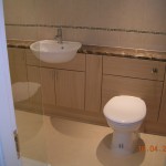 Back to wall WC, semi recessed basin, ceramic tiled floor
