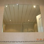Large mirror inset into tiles