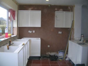 Base and wall units going in