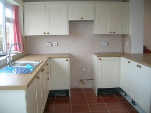 Sink in position and cupboard doors on